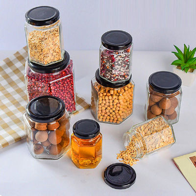 হেক্সাগন ক্লিয়ার গ্লাস স্টোরেজ বোতল 100ml 500ml মধু ক্রিমের জন্য ধাতব ঢাকনা সহ